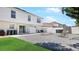 Charming backyard with a spacious patio area, mature trees and ample space for outdoor entertainment and relaxation at 11257 Dacre Ln, Orlando, FL 32824