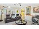 Bright living room featuring archways, tile floors, comfortable seating, and lots of space at 11257 Dacre Ln, Orlando, FL 32824