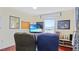 Inviting living room with comfortable seating, bright natural light and entertainment center for relaxation and enjoyment at 11257 Dacre Ln, Orlando, FL 32824
