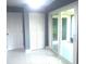 Bedroom with tile flooring, large windows, and closet at 11373 Darlington Dr, Orlando, FL 32837