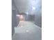 Neutral bedroom with bright lights and white flooring throughout at 11373 Darlington Dr, Orlando, FL 32837