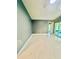 Bedroom with tile flooring and slider to enclosed patio at 11373 Darlington Dr, Orlando, FL 32837