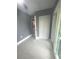 Modern bedroom with marble flooring and a sliding glass door to the backyard at 11373 Darlington Dr, Orlando, FL 32837