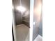 Walk-in closet with metal shelving and neutral colored walls and floors at 11373 Darlington Dr, Orlando, FL 32837