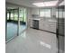 This well-lit kitchen features stainless steel appliances and a scenic view at 11373 Darlington Dr, Orlando, FL 32837