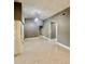 Open-concept living room featuring tile floors and access to other areas of the home at 11373 Darlington Dr, Orlando, FL 32837