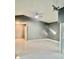 Large, open concept living room featuring marble floors and vaulted ceilings at 11373 Darlington Dr, Orlando, FL 32837