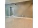 Living room with tile flooring, painted walls, and a bright and open feel at 11373 Darlington Dr, Orlando, FL 32837