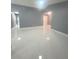 Bright living room with tile floors and vaulted ceiling at 11373 Darlington Dr, Orlando, FL 32837