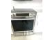 Modern stainless steel oven with electric cooktop and digital display, set against white cabinets at 11373 Darlington Dr, Orlando, FL 32837