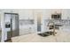 This newly remodeled kitchen includes stainless steel appliances and a center island at 117 Sanderling Dr, Haines City, FL 33844