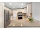 Well-appointed kitchen with granite countertops, stainless steel appliances, and ample cabinet space at 1195 Tivoli Dr, Deltona, FL 32725