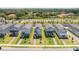 Aerial view of several light blue two-story homes with manicured lawns and landscaping at 12133 Bracco St, Winter Garden, FL 34787