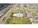 Aerial view showcasing the community pool, tennis courts, and playground at 12133 Bracco St, Winter Garden, FL 34787