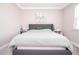 Bright bedroom featuring plush carpet, neutral walls, and a comfortable upholstered bed at 12133 Bracco St, Winter Garden, FL 34787