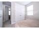 Well-lit bedroom showcasing a neutral color scheme, double closet and carpeted floors at 12133 Bracco St, Winter Garden, FL 34787