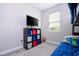 Bright bedroom with a storage system, bunk bed and bright window with natural light at 12133 Bracco St, Winter Garden, FL 34787