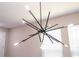 Modern and artistic chandelier with multiple lights creating a focal point at 12133 Bracco St, Winter Garden, FL 34787
