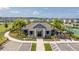 Charming community clubhouse with lush landscaping, parking, and recreational facilities at 12133 Bracco St, Winter Garden, FL 34787