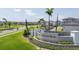 Highland Ridge community entrance featuring beautiful landscaping and signage at 12133 Bracco St, Winter Garden, FL 34787