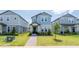 Charming two-story home with manicured front yard, stone walkway, and light blue facade at 12133 Bracco St, Winter Garden, FL 34787