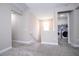 Open loft area with laundry room at 12133 Bracco St, Winter Garden, FL 34787