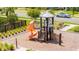 Playground featuring a slide, climbing structure, and shade covering at 12133 Bracco St, Winter Garden, FL 34787