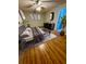 Cozy bedroom featuring sleek furniture, hardwood floors, and modern decor for a comfortable living space at 1219 Serissa Ct, Orlando, FL 32818