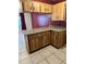 Kitchen features light wood cabinets and countertop space at 1219 Serissa Ct, Orlando, FL 32818