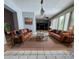 Spacious living room featuring contemporary decor, comfortable sofas, and ample natural light, perfect for gatherings at 1219 Serissa Ct, Orlando, FL 32818