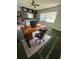 Comfortable home office featuring a modern desk, ergonomic chair, and custom shelving for efficient organization at 1219 Serissa Ct, Orlando, FL 32818
