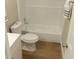 Updated bathroom features a toilet and shower/tub combo at 1220 Zapata Pl, Lady Lake, FL 32159