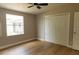 Neutral bedroom featuring a large closet, light walls, and light flooring at 1220 Zapata Pl, Lady Lake, FL 32159