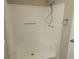 Bright shower with white surround and modern fixtures at 1220 Zapata Pl, Lady Lake, FL 32159