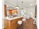 Well-designed kitchen with a central island, breakfast bar, and an open layout to the living area at 1401 Canberra Ave, Orlando, FL 32806
