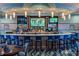 Relax at the full bar with multiple tvs at 1513 Maidstone Ct, Davenport, FL 33896