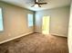 Bedroom with carpet floors, natural light, and neutral walls at 1513 Maidstone Ct, Davenport, FL 33896