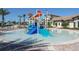 A fun splash pad with colorful play structures for children at 1513 Maidstone Ct, Davenport, FL 33896