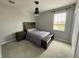 Cozy bedroom with carpet, neutral walls, and a full-sized bed at 15708 Orange Harvest Loop, Winter Garden, FL 34787