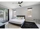 Sleek bedroom featuring a slider to the pool and an accent rug at 166 Minniehaha Cir, Haines City, FL 33844