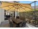 Screened patio featuring an outdoor dining set with seating for six at 166 Minniehaha Cir, Haines City, FL 33844