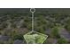 An aerial view of the property highlighting the homesite in a verdant residential neighborhood at 1800 Silver Valley Ct, Apopka, FL 32712