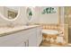 Elegant bathroom featuring double sinks, granite countertops, a luxurious soaking tub, and tiled accents at 1800 Silver Valley Ct, Apopka, FL 32712