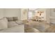Spacious living area with an open layout, hardwood floors, and a cozy sectional sofa at 1800 Silver Valley Ct, Apopka, FL 32712
