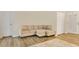 Comfortable living area with a cozy sectional sofa, hardwood floors, and neutral decor at 1800 Silver Valley Ct, Apopka, FL 32712