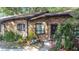 Charming brick townhome with well-maintained landscaping and inviting entrance, perfect for a cozy living space at 1803 Foxhall Cir # 1803, Kissimmee, FL 34741