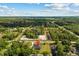 A lush backyard with a privacy fence and mature trees creating a peaceful outdoor retreat at 19073 Sabal St, Orlando, FL 32833