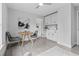 Charming breakfast nook with modern decor, table with chairs, and a view to a kitchen area at 19073 Sabal St, Orlando, FL 32833