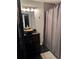 Bathroom featuring dark vanity, copper colored sink, and shower with gray curtain at 1950 Summer Club Dr # 202, Oviedo, FL 32765