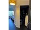 Open closet in the bedroom with visible shelving, clothes and accessories for ample storage at 1950 Summer Club Dr # 202, Oviedo, FL 32765